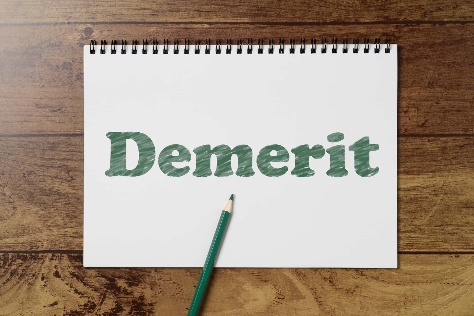 Demeritと書かれているスケッチブック